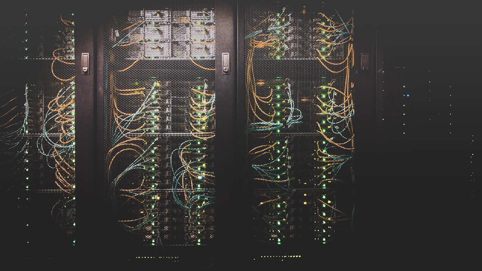 A dense bundle of network cables connected to a server rack